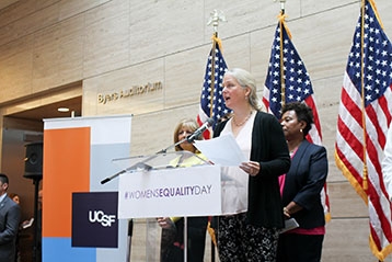 Cynthia Harper speaking at Women's Equality Day at UCSF